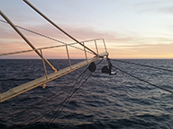 Picture showing the fishing boom of a scallop trawler